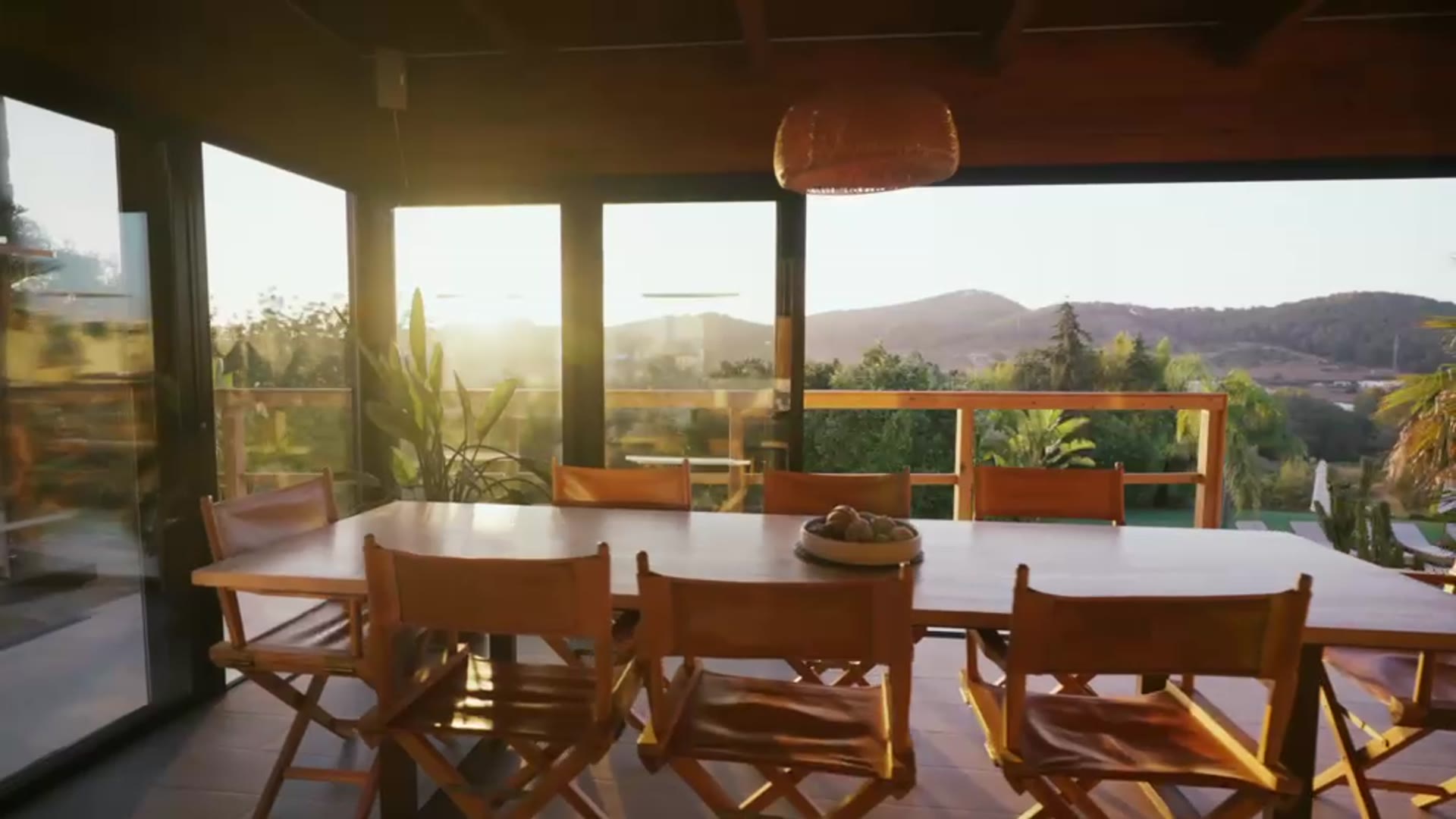 Long-table dining terrace at golden hour